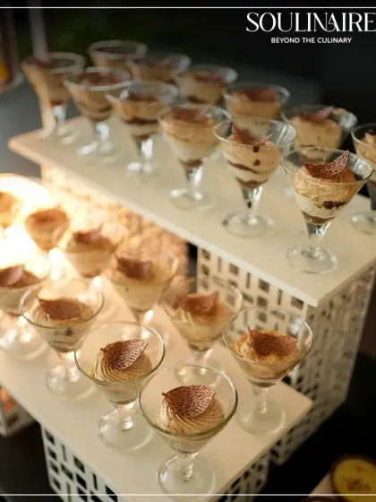 A display of tiramisu in martini glasses at the Tata Harrier EV launch. Our desserts are as dynamic and stylish as the brands we serve.