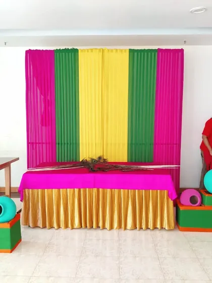 Another angle of the Janamashtmi setup in progress. The design is simple yet festive, perfect for creating a devotional atmosphere in a society clubhouse or home.