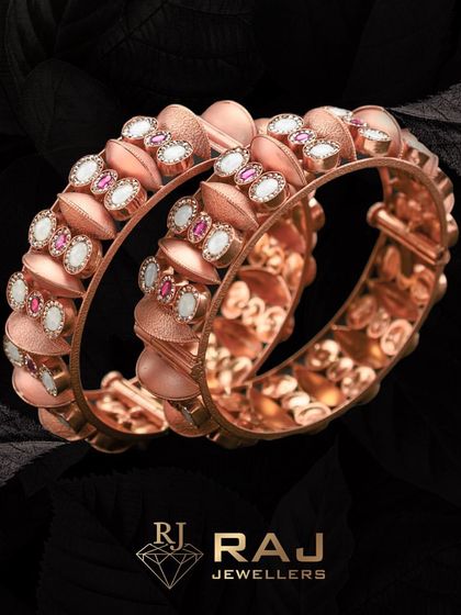 Unleash your inner goddess with these stunning rose gold bangles. The intricate design features a scalloped pattern set with white and pink stones, adding a touch of elegant arm candy to any outfit.