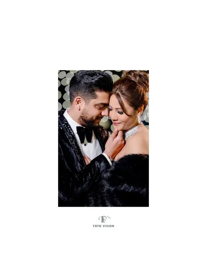 A soft, romantic portrait of the couple. The close framing and gentle expressions create a feeling of deep connection and love.