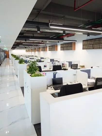 A look at the expansive open-plan workspace in our new Delhi office. The design promotes collaboration and efficiency, reflecting our commitment to a dynamic work environment for our team.