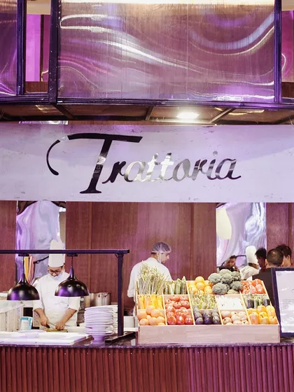 A live station for the Italian classic, Trattoria, with fresh vegetables on display. We bring the authentic experience of our marquee restaurants to your event.
