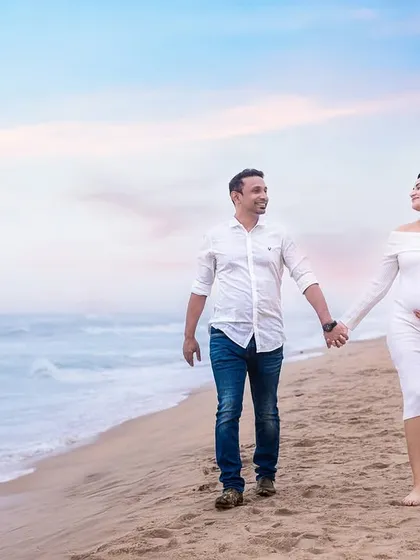 Simple, elegant, and timeless. A classic white dress is perfect for a serene beach photoshoot, creating a clean and natural look that focuses on your glow and the beautiful surroundings.