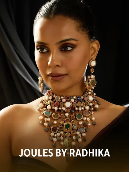 A beautiful portrait of Aneri Vajani, her expression as captivating as the couture necklace she wears.