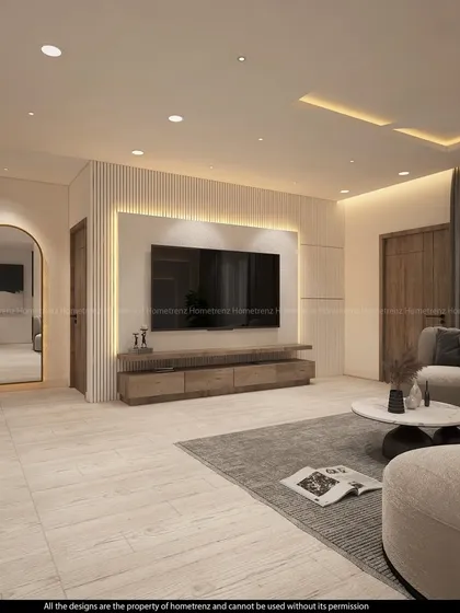 A full view of a modern living room, showcasing the TV unit with a fluted panel accent wall, a large arched mirror to create a sense of space, and comfortable, low-profile seating.