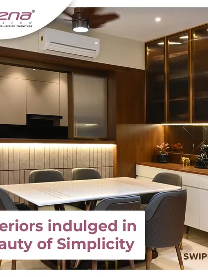 A great kitchen design considers the adjoining spaces. Here, the dining area is designed to complement the kitchen, with warm wood tones and soft lighting creating a cohesive and inviting atmosphere for family meals.