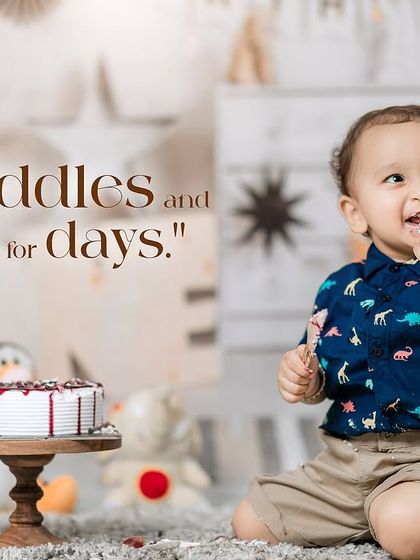 Cuddles and giggles for days. This happy toddler enjoys his cake during a fun and relaxed first birthday studio session.