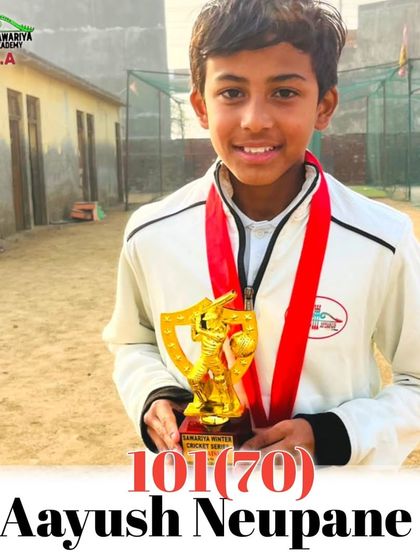 Aayush Neupane proudly displays his trophy after scoring a century in our own Sawariya Series tournament.