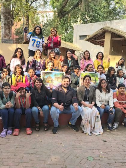 Another fantastic group shot of our students and instructors, celebrating a successful day of outdoor art and creativity.