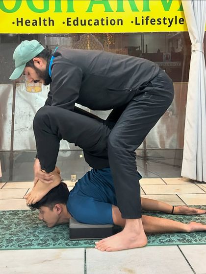 My Guru changed my life. This image shows an intense adjustment, a testament to his teaching style: "Wapas nahi aana hai!" (Don't come back!). He taught me discipline, surrender, and the true meaning of devotion.