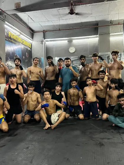 The aftermath of a tough evening training session. This is our fight family, bonded by sweat and hard work. We push each other to be better, stronger, and ready for any challenge.