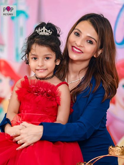 A vibrant 'Circus' themed birthday party, with red and white stripes, clown props, and colorful balloons, bringing the excitement of the big top to your event.