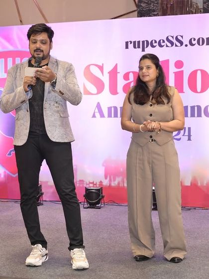 Co-hosting a segment on stage. I am adaptable and work well with other presenters to create a dynamic and seamless experience for the audience.