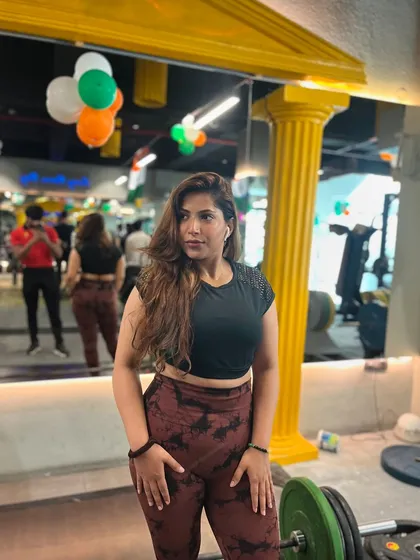 Strength and beauty go hand in hand. Here I am in the gym, ready to lift and build a powerful body.