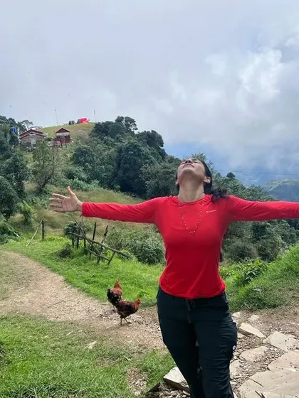 Feeling the freedom and joy of being in nature, surrounded by the hills and chickens of a small Nepalese village.