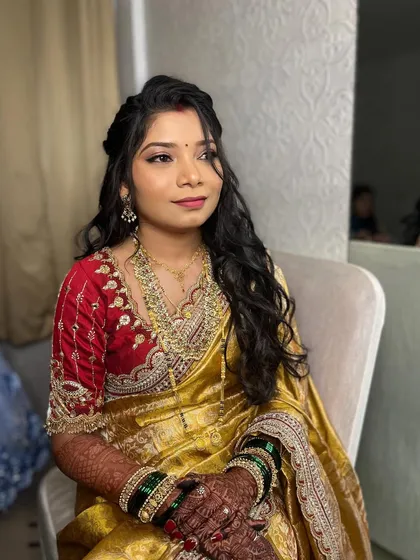 Another shot showcasing this unfiltered beauty. The soft waves in her hair perfectly frame her face, and the makeup highlights her features without masking them.