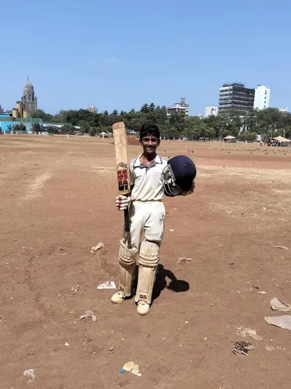 Aayush celebrating a milestone on the maidan. This is the dream for every young Mumbai cricketer, and I help them achieve it.