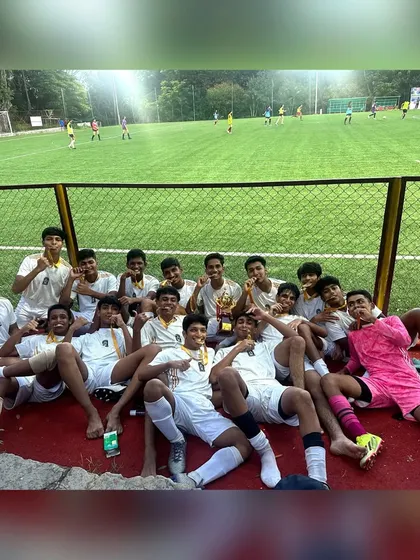The victorious Vasant Vihar team after their championship win, a proud moment for the players and our academy.