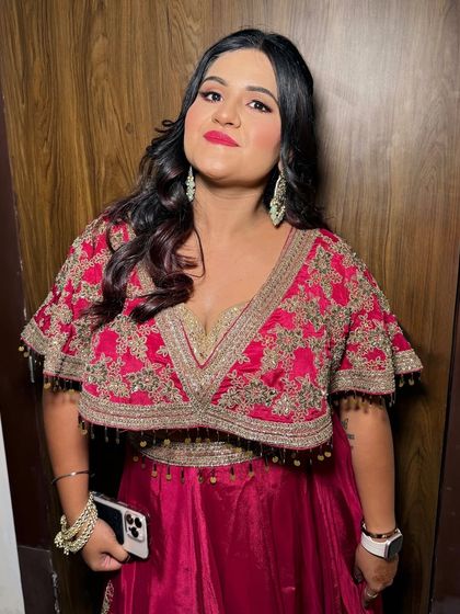 A happy and glamorous client, ready for her event.