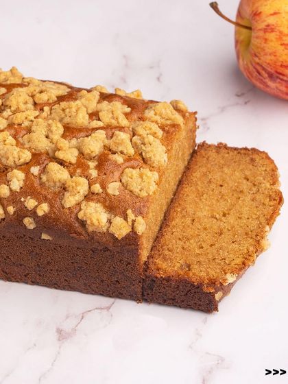 Our apple crumble loaf cake. A soft, spiced apple cake with a delicious crumble topping, it's like a portable apple pie.