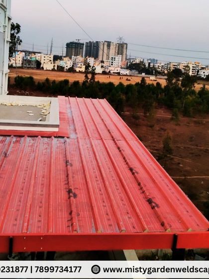 An aerial view of the completed puff sheet roof. The ribbed design helps with water drainage, and the material itself is highly effective at blocking heat.