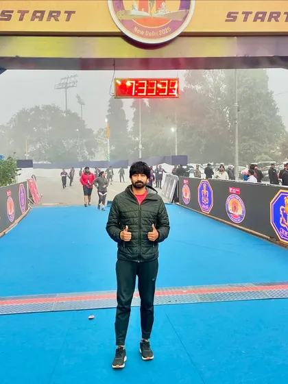 At the finish line of the Indian Navy Marathon in New Delhi. I am present from start to finish, managing the event and ensuring everything runs on schedule.