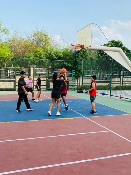 A female player takes a shot during a morning session.