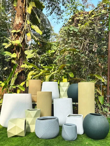 A collection of my modern planters in various shapes, sizes, and neutral colors, perfect for sprucing up your home.