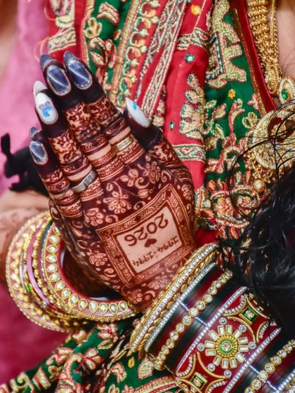 A close-up of a baby shower mehendi that incorporates the year, making it a beautiful keepsake of this special time.