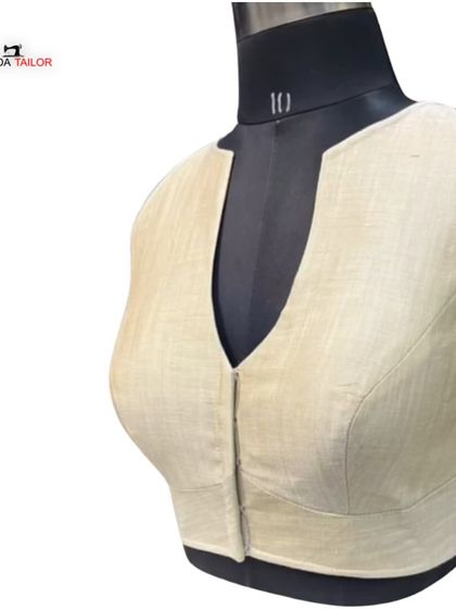 This modern, sleeveless V-neck blouse is another example of my manufacturing capabilities. If you are a textile retailer, I can produce your designs in bulk.