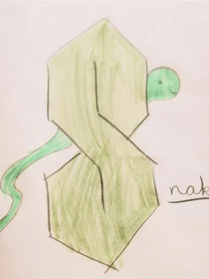 A creative take on the letter 'S', transformed into a snake. This is a great example of how we encourage kids to think outside the box in their art.