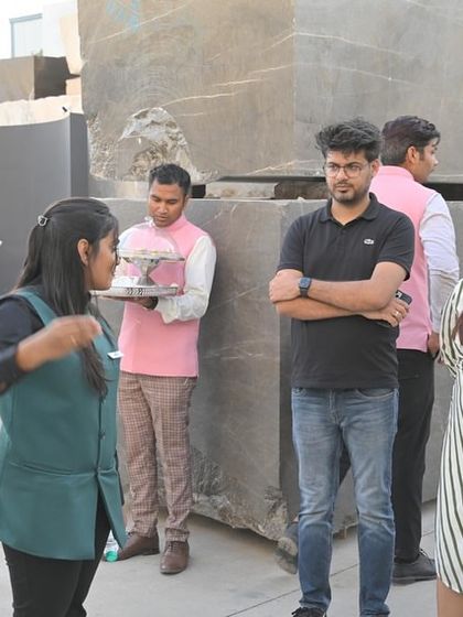 Kunal and Aishwarya observing the different types of marble blocks at the stockyard in Kishangarh.