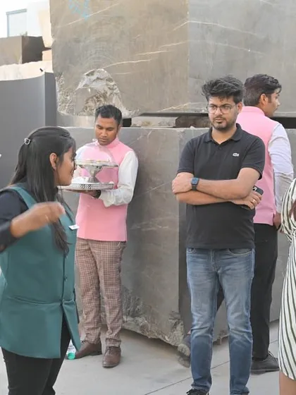 Kunal and Aishwarya observing the different types of marble blocks at the stockyard in Kishangarh.