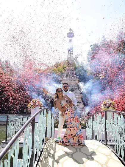This moment, set against a mini Eiffel Tower, was the Paris stop in our 'Around the World' carnival. A shower of confetti and smoke created a picture-perfect romantic climax for the entry.