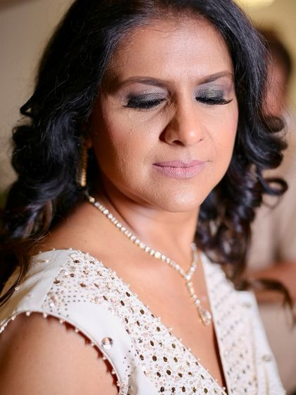 A close-up of the smokey eye makeup. I use techniques that define the eyes beautifully without being too harsh on mature skin.