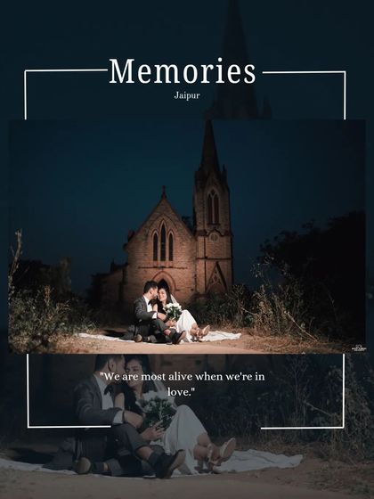 A romantic night picnic scene set before a historic church in Jaipur, with the couple framed by the dramatic architecture under a dark sky.