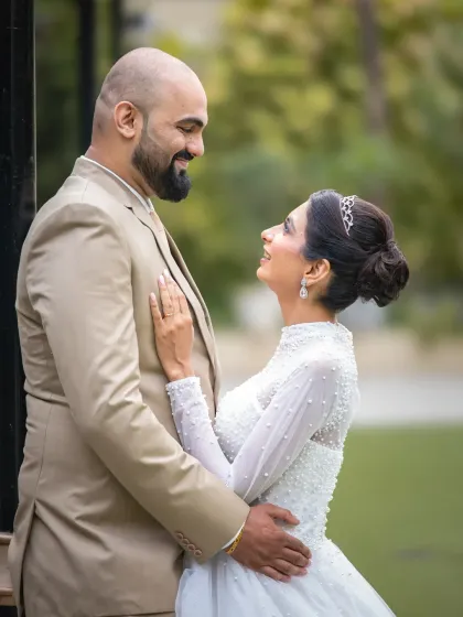 The look of love. This close-up wedding portrait beautifully captures the adoration and happiness shared between the bride and groom.