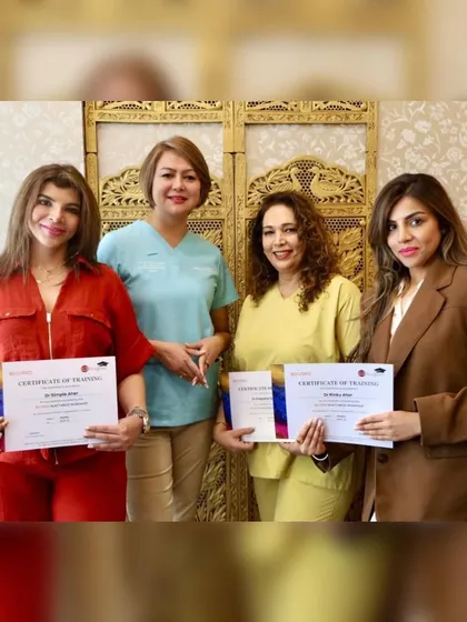 With fellow doctors, proudly holding our certificates of training after the Belotero fillers workshop. Continuous learning is key.