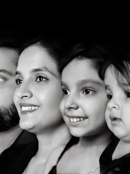 A unique and artistic black and white profile shot of the whole family. This style of portrait is timeless and focuses purely on the faces and connection of the family.