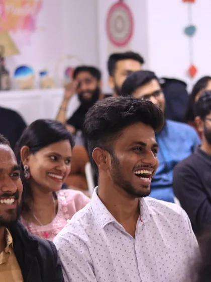 More smiles from the crowd at our Kannada open mic.