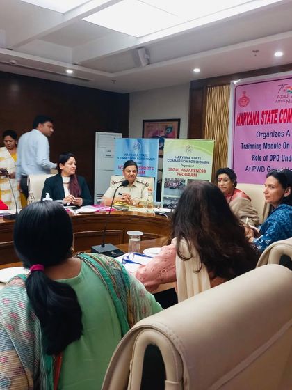 A view of the panel during a training module on Domestic Violence. These multi-stakeholder discussions, involving police and the women's commission, are incredibly effective.