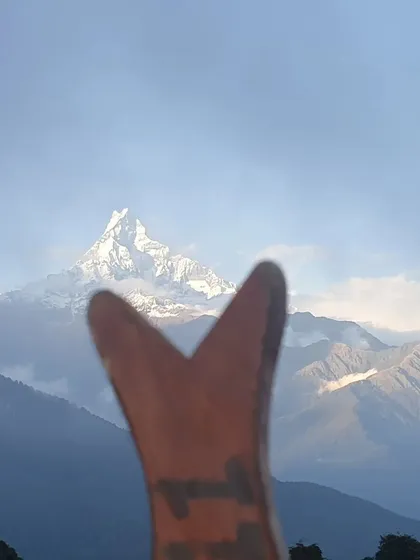 The iconic peak of Machapuchare, a constant, inspiring presence during our Nepal retreat.
