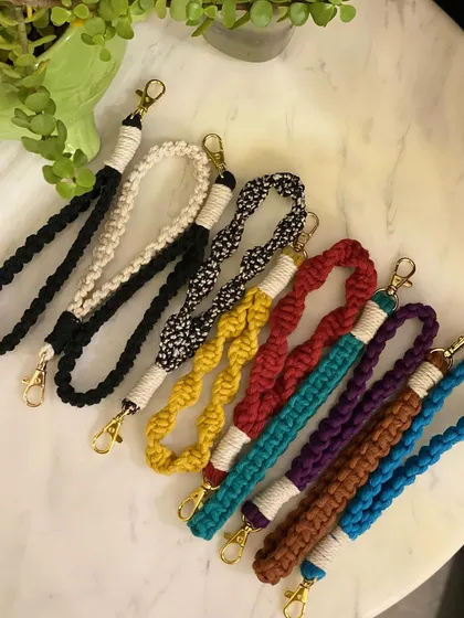 A quick look at the variety of macrame wristlets I make. They come in many colors and knot styles, perfect for keeping your keys handy or just adding a pop of color to your main bag.