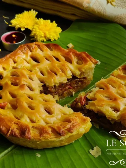 Showcasing my savoury side with this Egg Roast Puff Pie. I make the flaky puff pastry from scratch and fill it with a flavourful egg roast masala, creating a perfect snack or light meal.