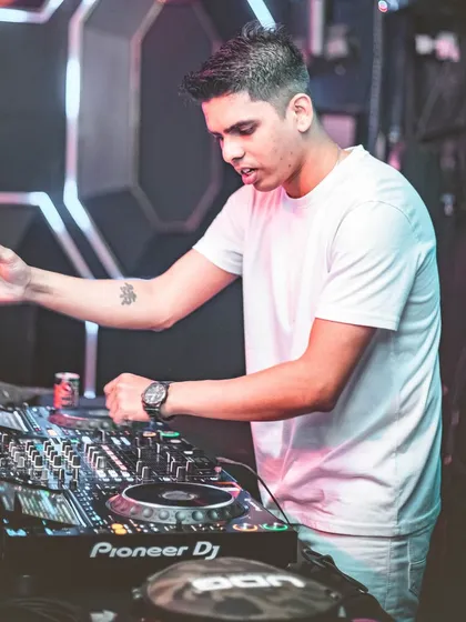 Music is my passion, DJing is my art. A close-up of my hands on the mixer.