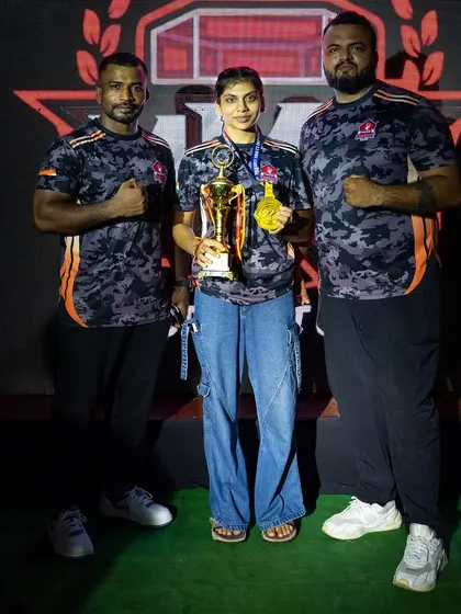 Our champions with their trophies and medals from the Hades MMA event. When you start in the dark and grind your way to the light, the victory is that much sweeter.