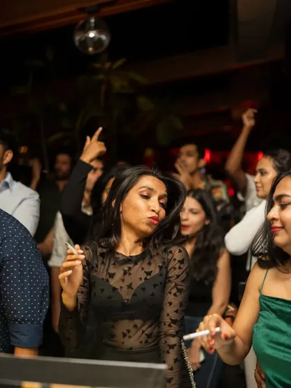 The crowd at Taki Taki, fully enjoying the Saturday night vibe.