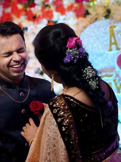 A candid moment of pure laughter between the couple during their engagement. These unposed, genuine moments are often the most cherished memories.