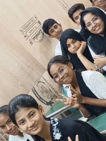 Students posing at their desks during Black and White Day, a simple yet fun theme that everyone enjoyed.