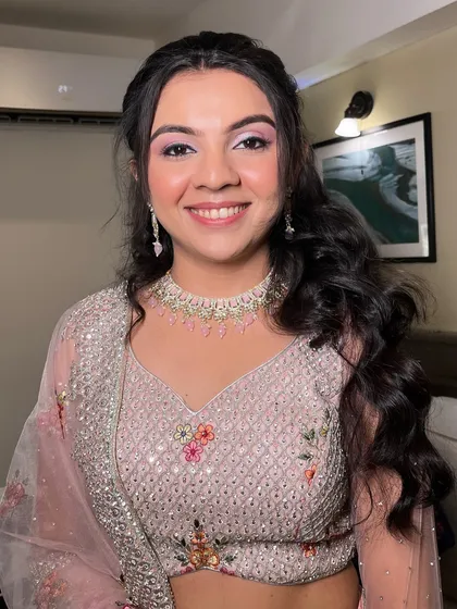 A close-up of this pretty-in-pink engagement look. The makeup is blended to perfection, creating a seamless and radiant finish.